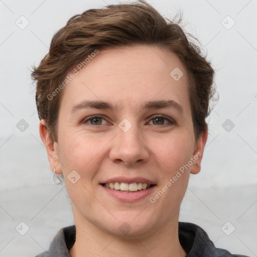 Joyful white young-adult female with short  brown hair and grey eyes