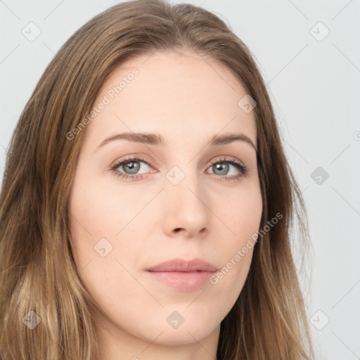 Neutral white young-adult female with long  brown hair and brown eyes