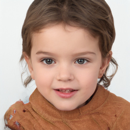 Joyful white child female with short  brown hair and brown eyes