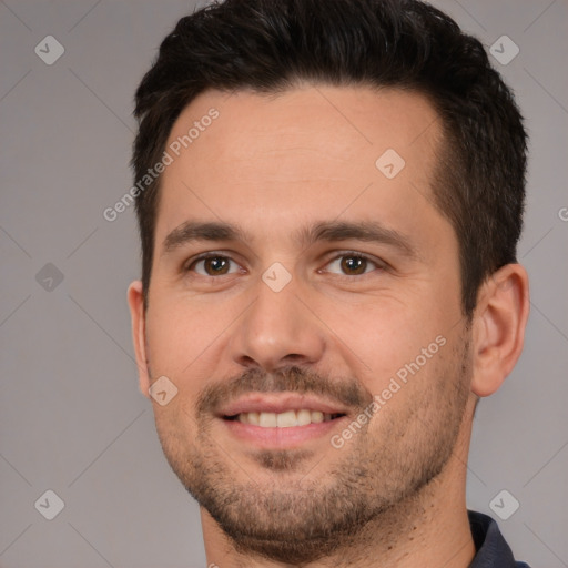 Joyful white young-adult male with short  brown hair and brown eyes