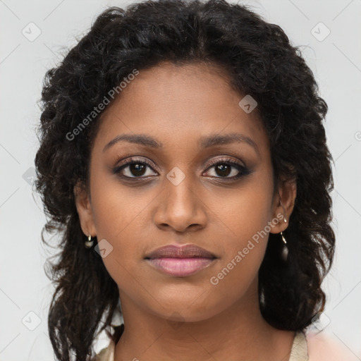 Joyful black young-adult female with long  brown hair and brown eyes