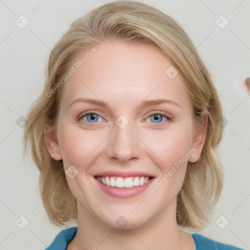 Joyful white young-adult female with medium  brown hair and blue eyes