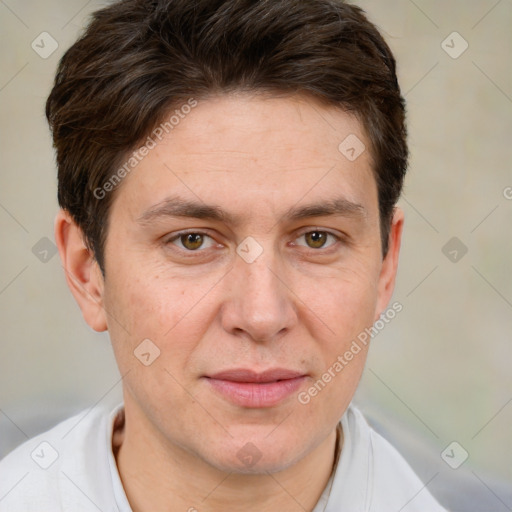 Joyful white adult male with short  brown hair and brown eyes