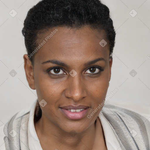 Joyful black young-adult female with short  brown hair and brown eyes