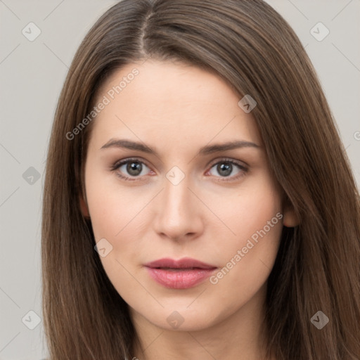 Neutral white young-adult female with long  brown hair and brown eyes