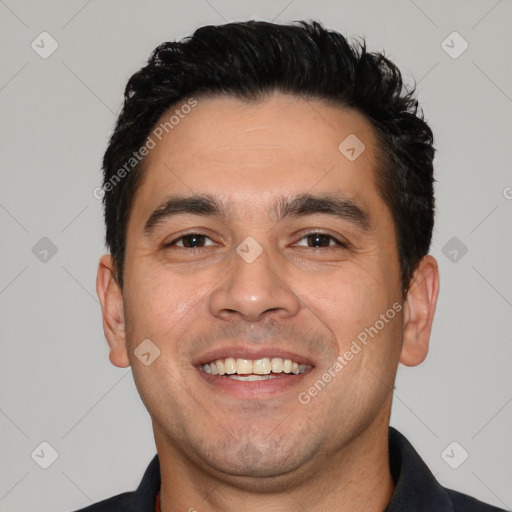 Joyful white young-adult male with short  black hair and brown eyes