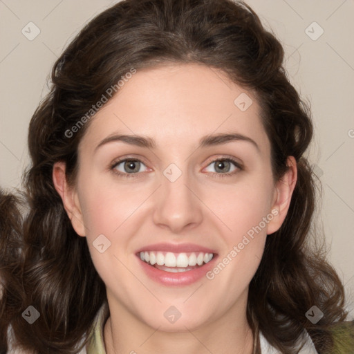 Joyful white young-adult female with medium  brown hair and green eyes