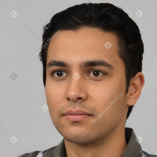 Neutral latino young-adult male with short  black hair and brown eyes