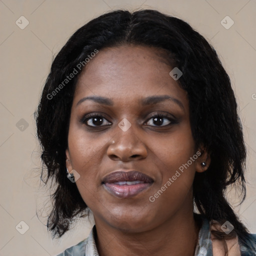 Joyful black young-adult female with medium  black hair and brown eyes