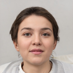 Neutral white young-adult female with short  brown hair and brown eyes