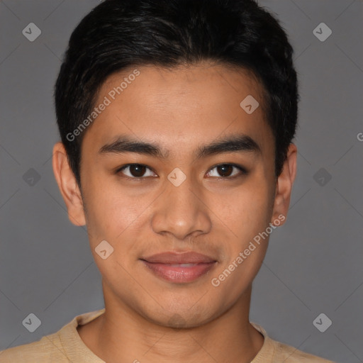 Joyful latino young-adult male with short  brown hair and brown eyes