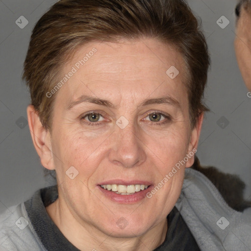 Joyful white adult female with short  brown hair and brown eyes