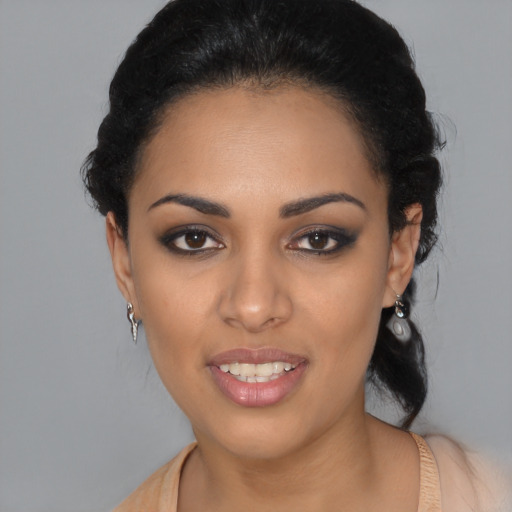 Joyful latino young-adult female with medium  black hair and brown eyes