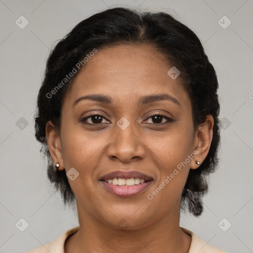 Joyful latino young-adult female with short  brown hair and brown eyes