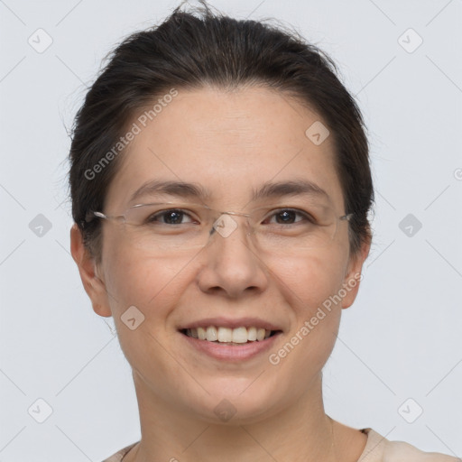 Joyful white adult female with short  brown hair and brown eyes