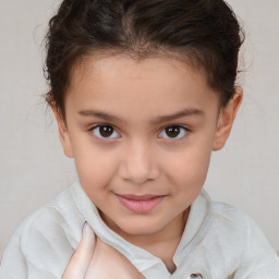 Joyful white child female with short  brown hair and brown eyes