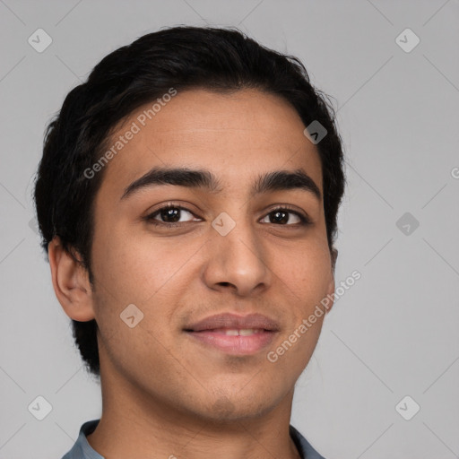 Joyful latino young-adult male with short  brown hair and brown eyes