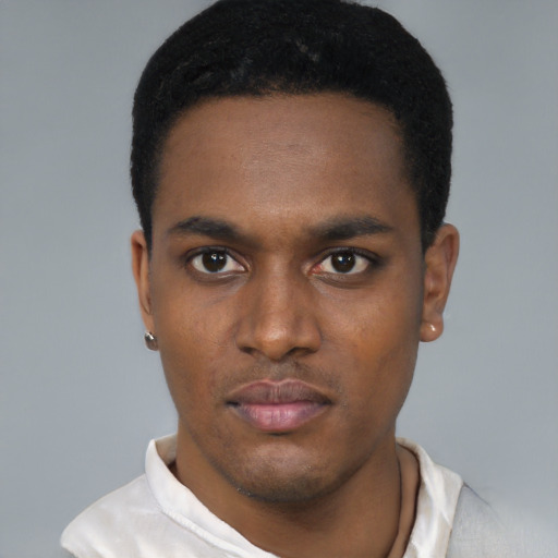 Neutral black young-adult male with short  black hair and brown eyes