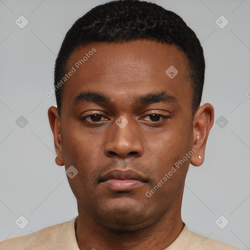 Neutral latino young-adult male with short  black hair and brown eyes