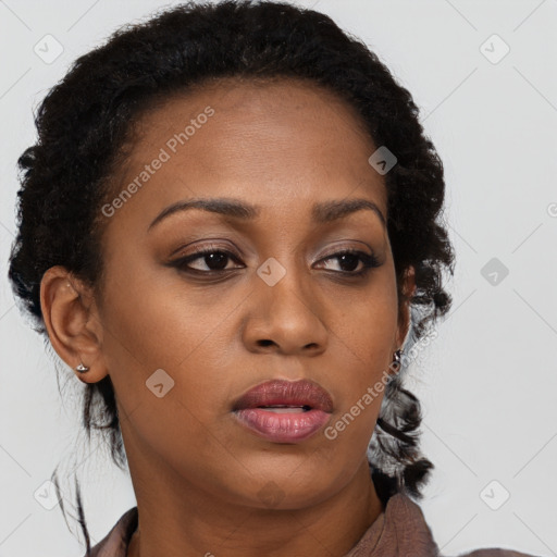 Neutral black young-adult female with long  brown hair and brown eyes