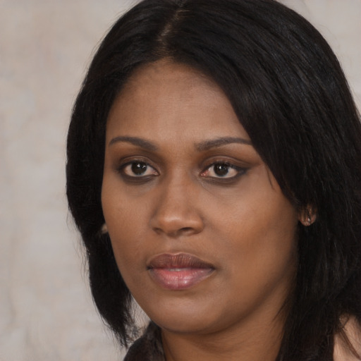 Neutral black young-adult female with long  black hair and brown eyes