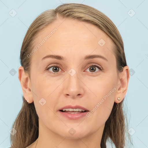 Joyful white young-adult female with medium  brown hair and grey eyes