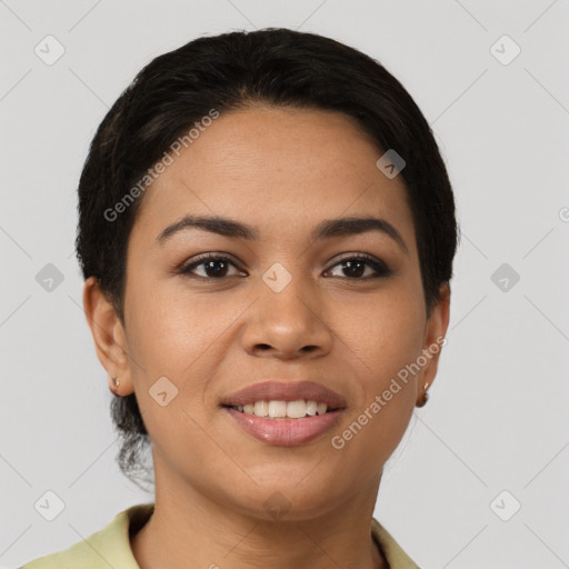 Joyful latino young-adult female with short  brown hair and brown eyes