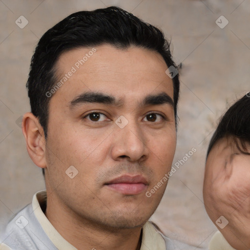 Neutral white young-adult male with short  black hair and brown eyes