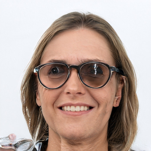 Joyful white adult female with medium  brown hair and blue eyes