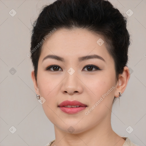 Joyful asian young-adult female with short  brown hair and brown eyes