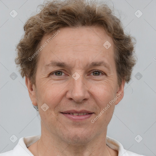 Joyful white middle-aged male with short  brown hair and brown eyes