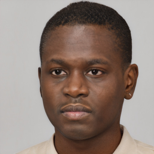 Neutral black young-adult male with short  brown hair and brown eyes