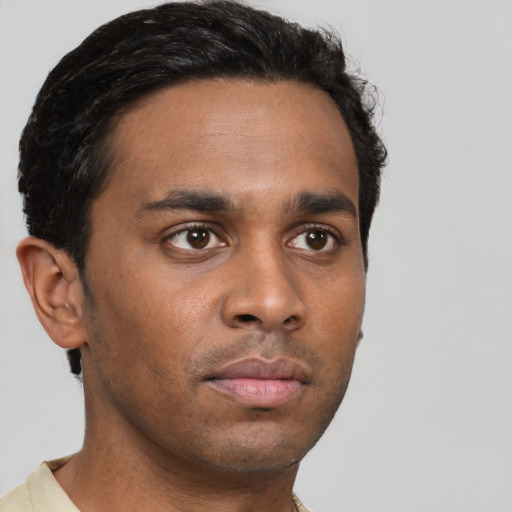 Neutral black young-adult male with short  black hair and brown eyes