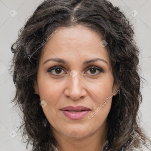 Joyful white adult female with long  brown hair and brown eyes