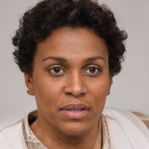 Neutral black young-adult female with short  brown hair and brown eyes