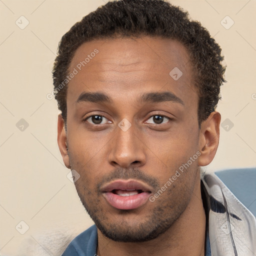 Neutral black young-adult male with short  brown hair and brown eyes