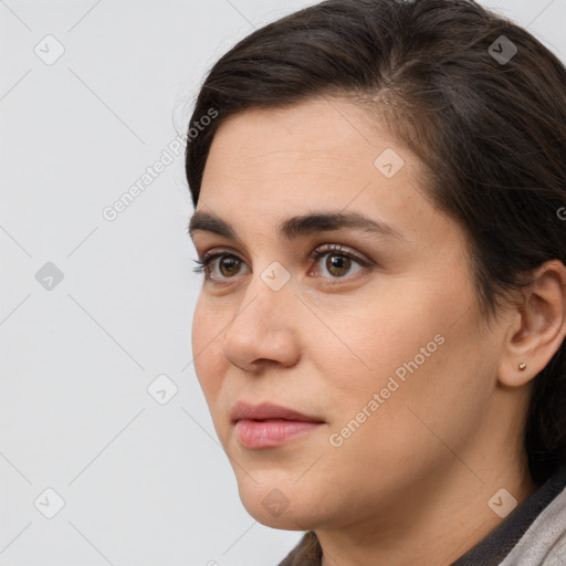 Neutral white young-adult female with long  brown hair and brown eyes