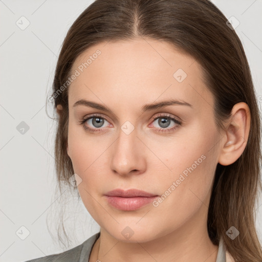 Neutral white young-adult female with long  brown hair and grey eyes