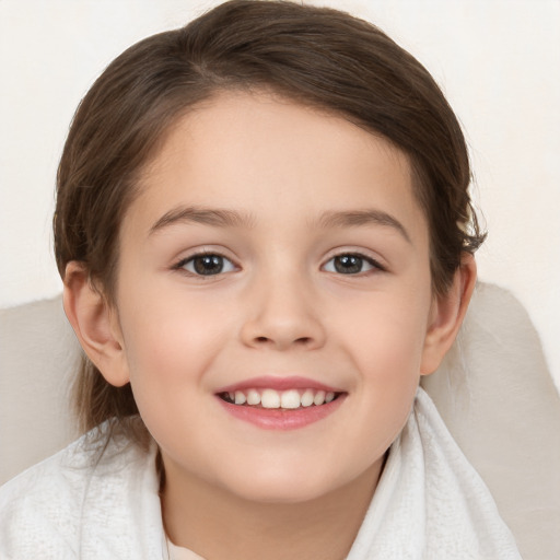 Joyful white child female with medium  brown hair and brown eyes