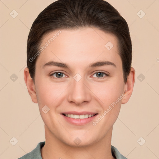 Joyful white young-adult female with short  brown hair and brown eyes