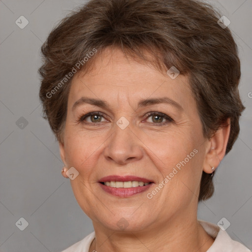 Joyful white adult female with short  brown hair and brown eyes