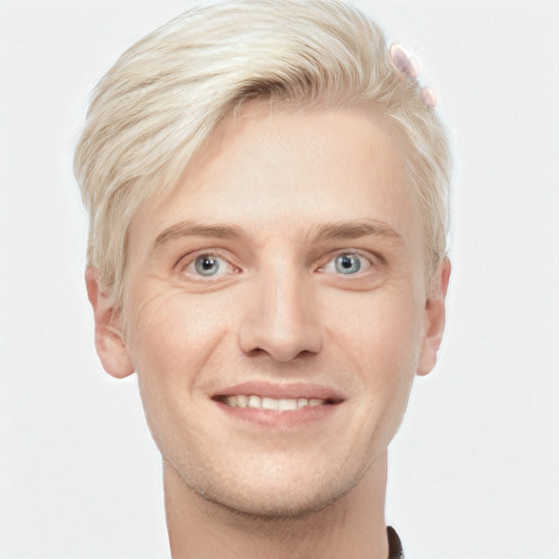 Joyful white young-adult male with short  blond hair and blue eyes