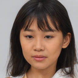 Neutral asian young-adult female with medium  brown hair and brown eyes