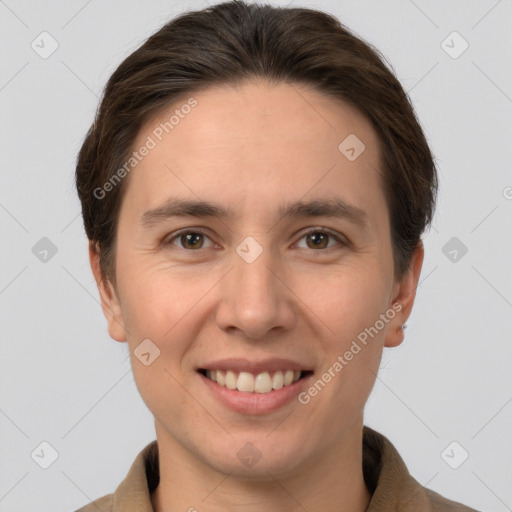 Joyful white young-adult female with short  brown hair and brown eyes