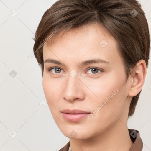 Neutral white young-adult female with short  brown hair and brown eyes