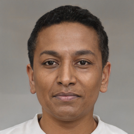 Neutral latino adult male with short  black hair and brown eyes