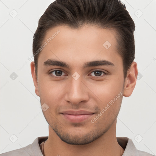 Joyful white young-adult male with short  brown hair and brown eyes