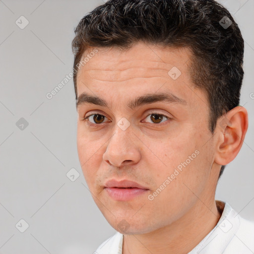 Joyful white young-adult male with short  brown hair and brown eyes