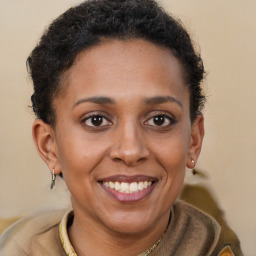 Joyful latino young-adult female with short  brown hair and brown eyes