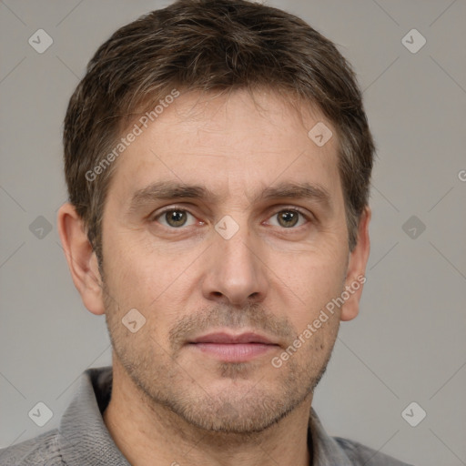 Neutral white adult male with short  brown hair and grey eyes